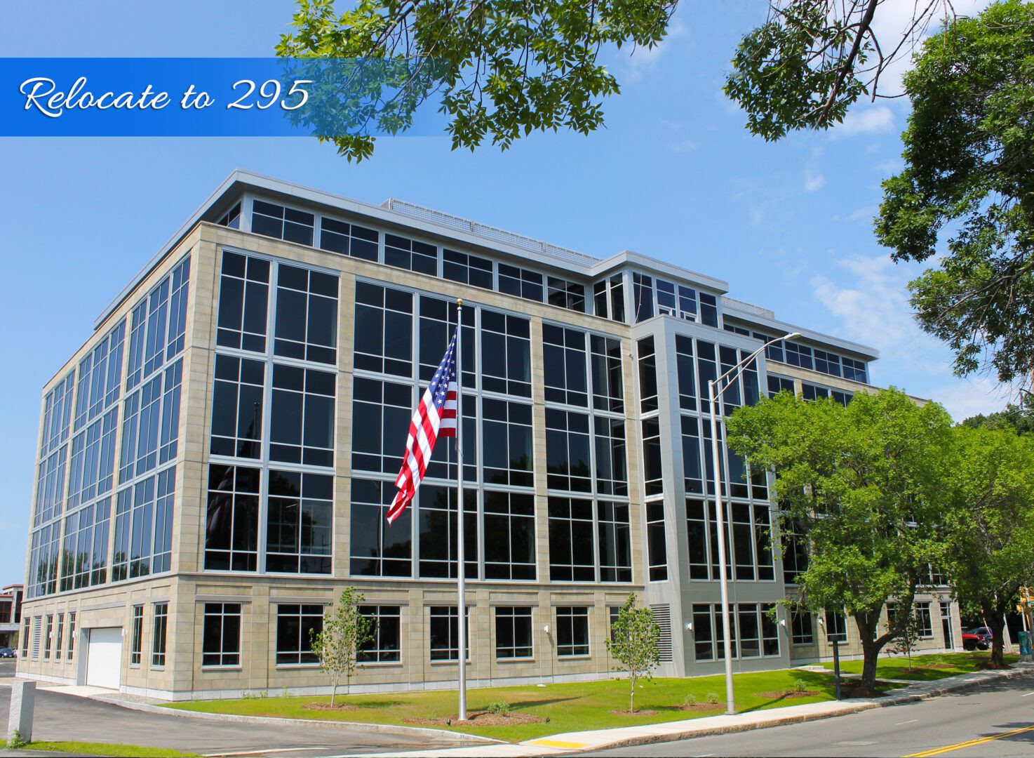 A large building with an american flag on the front.